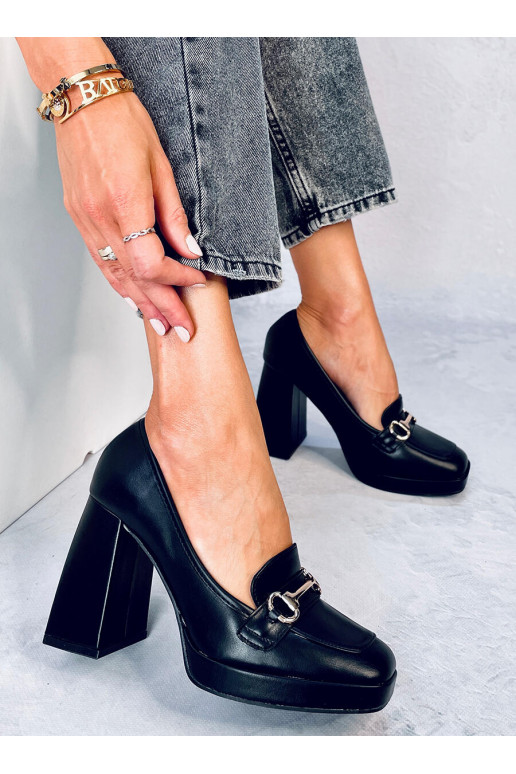 Een stijlvolle schoen met dikke hak...