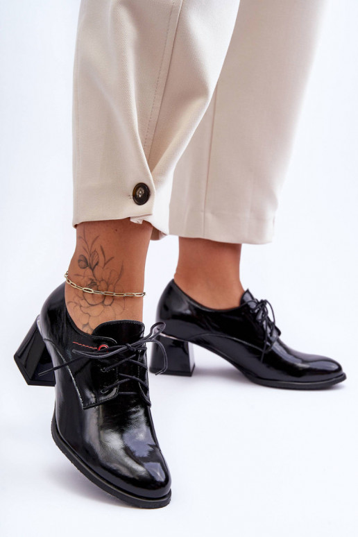 Bottines laquées à talons de couleur... Bottines laquées à talons de couleur...