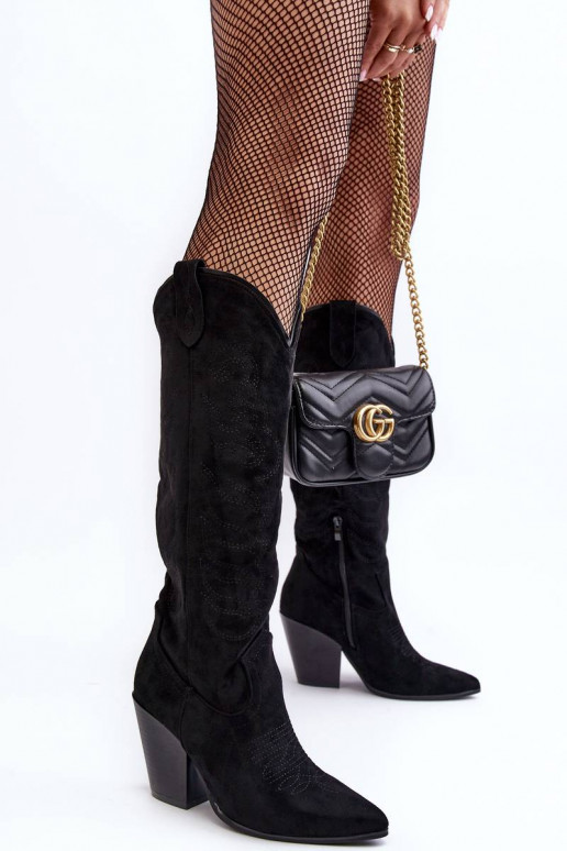 bottes longues de style cowboy à... bottes longues de style cowboy à...