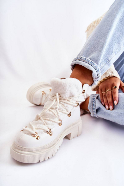 Bottes chauffantes de couleur blanche... Bottes chauffantes de couleur blanche...