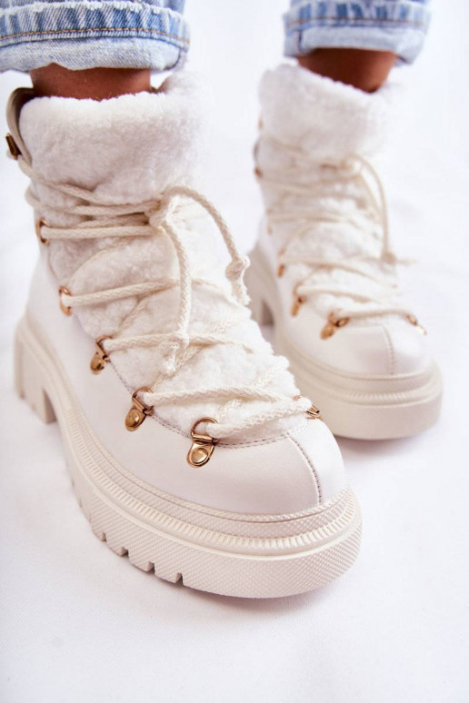 Bottes chauffantes de couleur blanche... Bottes chauffantes de couleur blanche...