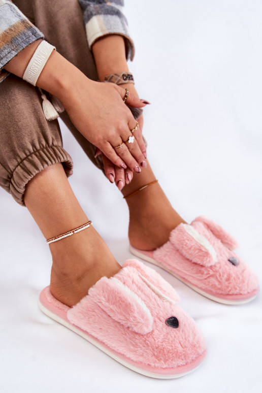 Tongs avec fourrure Remmi dans une teinte rose clair