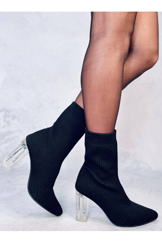 Bottines stylées à talon transparent...