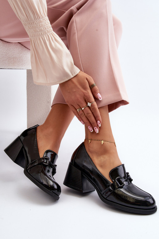 Gelakte schoenen met hakken in de... Gelakte schoenen met hakken in de...