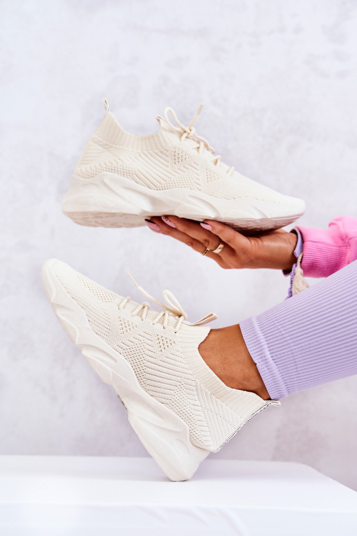 Chaussures modèle baskets en matière couleur ivoire Nolene