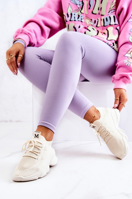 Chaussures modèle baskets en matière couleur ivoire Nolene