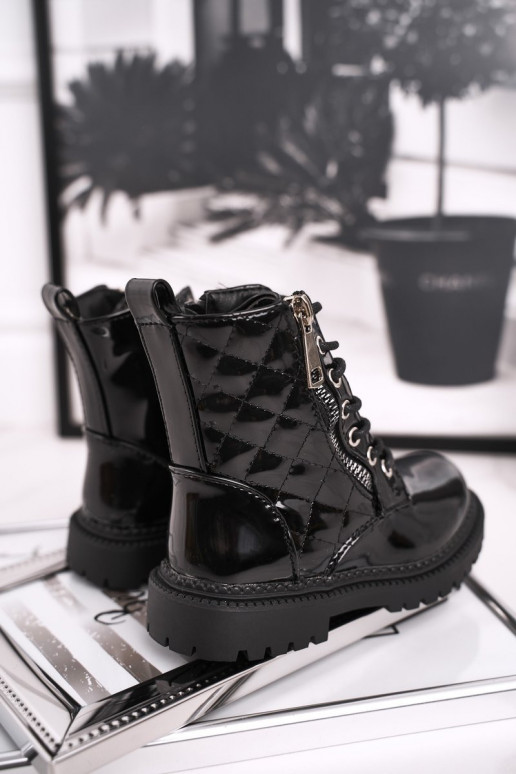 Boots femme laquées noires