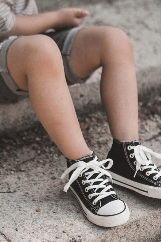 Kinderschoenen met zwarte zolen Kinderschoenen met zwarte zolen