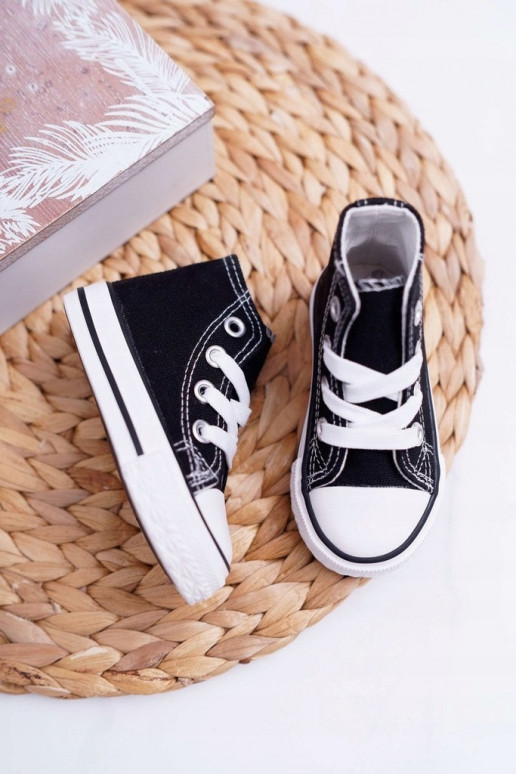 Kinderschoenen met zwarte zolen Kinderschoenen met zwarte zolen