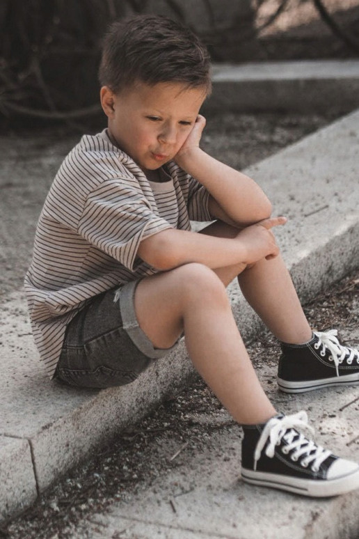 Kinderschoenen met zwarte zolen Kinderschoenen met zwarte zolen