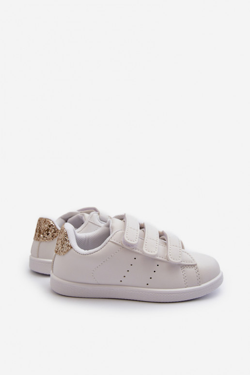 Kinder-Sneaker mit Klebeverschlüssen in der Farbe Weißgold „Cute Girl“. Kinder-Sneaker mit Klebeverschlüssen in der Farbe Weißgold „Cute Girl“.