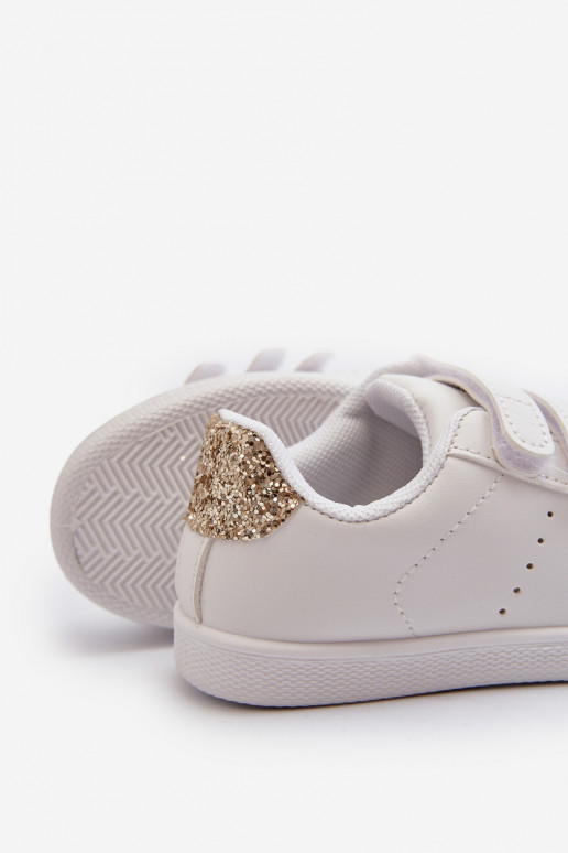 Kinder-Sneaker mit Klebeverschlüssen in der Farbe Weißgold „Cute Girl“. Kinder-Sneaker mit Klebeverschlüssen in der Farbe Weißgold „Cute Girl“.