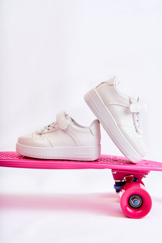 Chaussures de sport pour enfants à fermetures adhésives de couleur blanche Elike Chaussures de sport pour enfants à fermetures adhésives de couleur blanche Elike