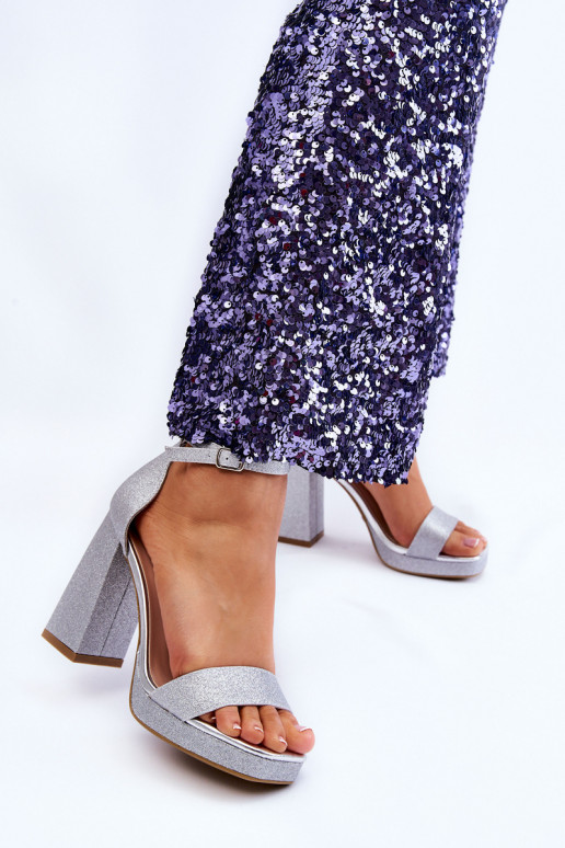 Glinsterende sandalen met brede hak in zilver Calmi