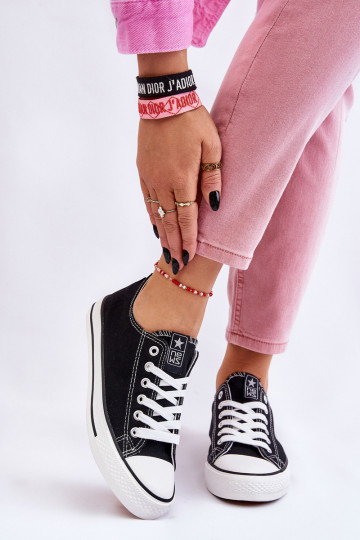 Klassische Freizeitschuhe in schwarzer Farbe mit weißen Sohlen von Ecoma 2