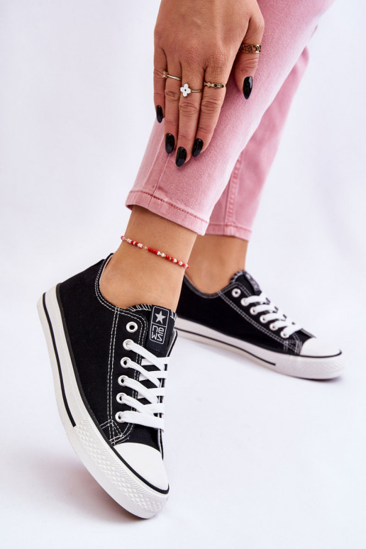Chaussures de loisirs modèle classique de couleur noire avec semelles blanches Ecoma