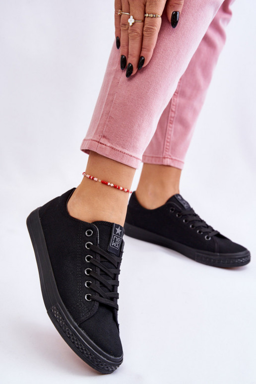 avec lanières Chaussures de loisirs modèle Classique de couleur noire Eleya