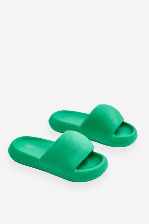 Chaussons légers à semelle plaquée or en vert Milton