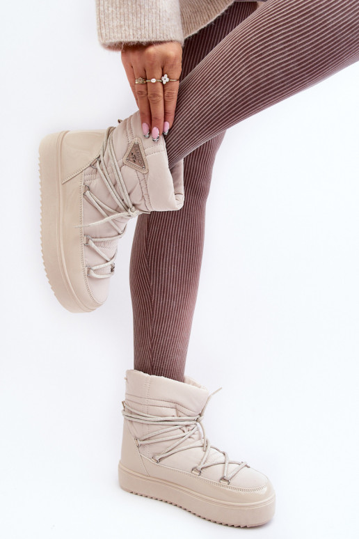 bottes de neige avec plateforme et détails élégants en beige Fleure bottes de neige avec plateforme et détails élégants en beige Fleure