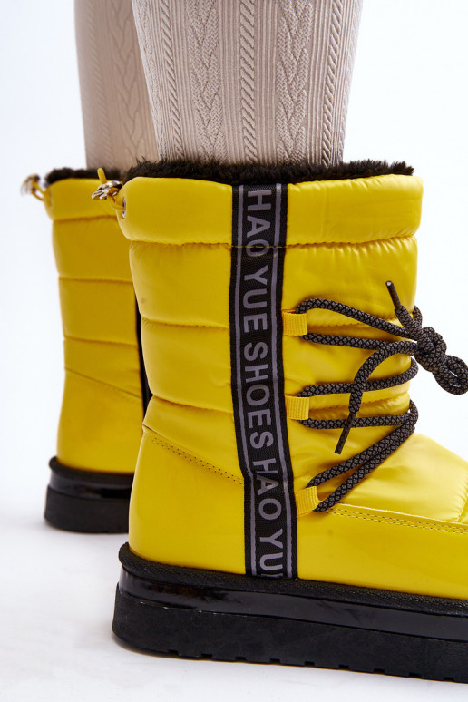 bottes de neige avec détails élégants en jaune Lilara bottes de neige avec détails élégants en jaune Lilara