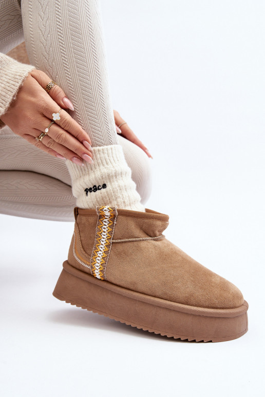 Gemusterte Plateau-Schneestiefel in braunem Udra Gemusterte Plateau-Schneestiefel in braunem Udra