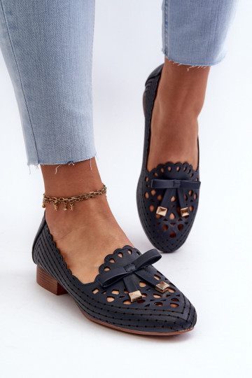 Opengewerkte ballerina's met linten in donkerblauw Unstable