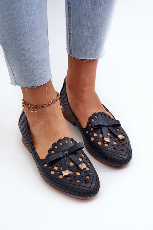 Opengewerkte ballerina's met linten in donkerblauw Unstable