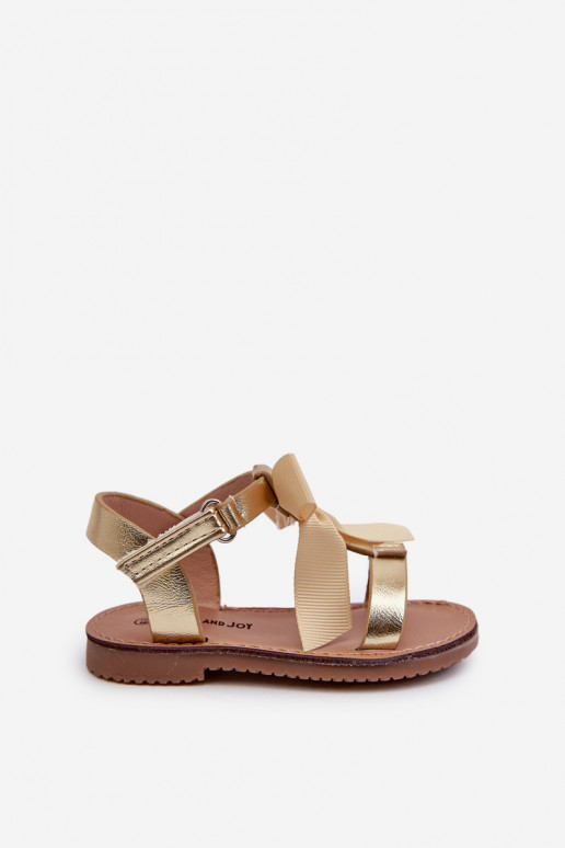 Sandalen für Kinder mit Bändern und Klebeverschlüssen in der Farbe Gold Joratia