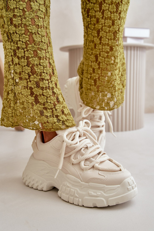 Sneakers Modell Schuhe Damen mit modischen massiven Sohlen in der Farbe Elfenbein Nevela Sneakers Modell Schuhe Damen mit modischen massiven Sohlen in der Farbe Elfenbein Nevela
