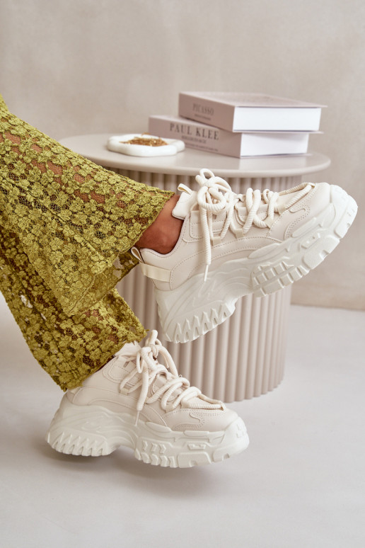 Sneakers Modell Schuhe Damen mit modischen massiven Sohlen in der Farbe Elfenbein Nevela Sneakers Modell Schuhe Damen mit modischen massiven Sohlen in der Farbe Elfenbein Nevela