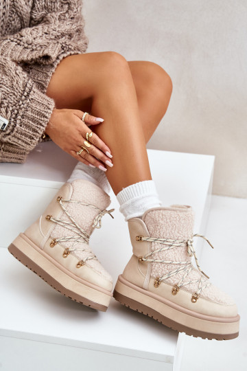 Bottes de neige Féminin avec une plateforme et des détails élégants couleur ivoire Riaviana