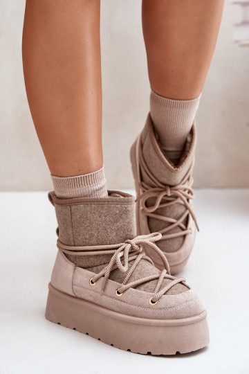 Sneeuwlaarzen met stijlvolle details en plateau in beige 2