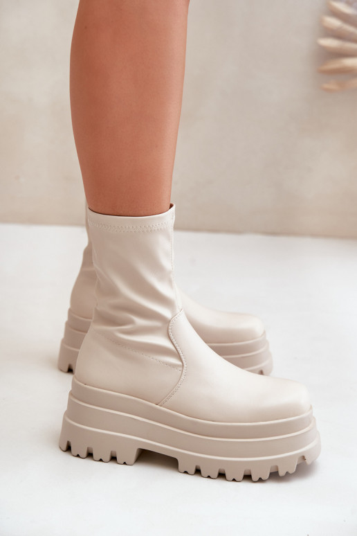Bottes avec une plateforme couleur ivoire Florinara Bottes avec une plateforme couleur ivoire Florinara