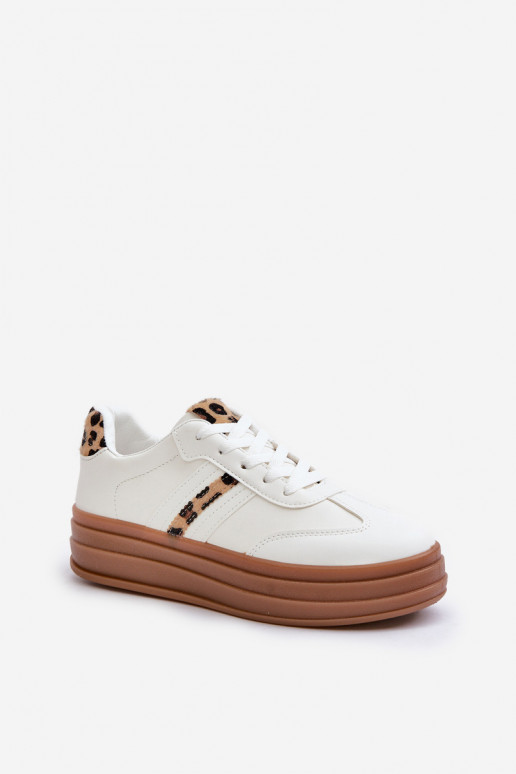 Chaussures modèle baskets Féminin avec une plateforme avec des motifs en fourrure de léopard couleur blanche Dravinnia Chaussures modèle baskets Féminin avec une plateforme avec des motifs en fourrure de léopard couleur blanche Dravinnia