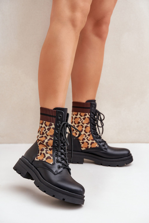 Bottines de travail Féminin avec une semelle intérieure de type chaussette avec des motifs en fourrure de léopard couleur noire  Bottines de travail Féminin avec une semelle intérieure de type chaussette avec des motifs en fourrure de léopard couleur noire