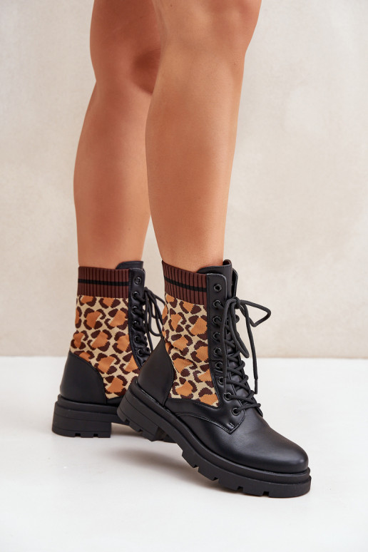 Bottines de travail Féminin avec une semelle intérieure de type chaussette avec des motifs en fourrure de léopard couleur noire  Bottines de travail Féminin avec une semelle intérieure de type chaussette avec des motifs en fourrure de léopard couleur noire