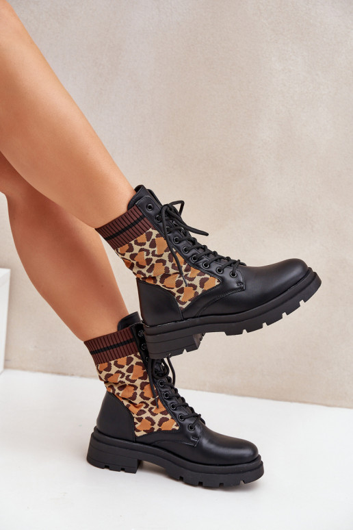 Bottines de travail Féminin avec une semelle intérieure de type chaussette avec des motifs en fourrure de léopard couleur noire  Bottines de travail Féminin avec une semelle intérieure de type chaussette avec des motifs en fourrure de léopard couleur noire
