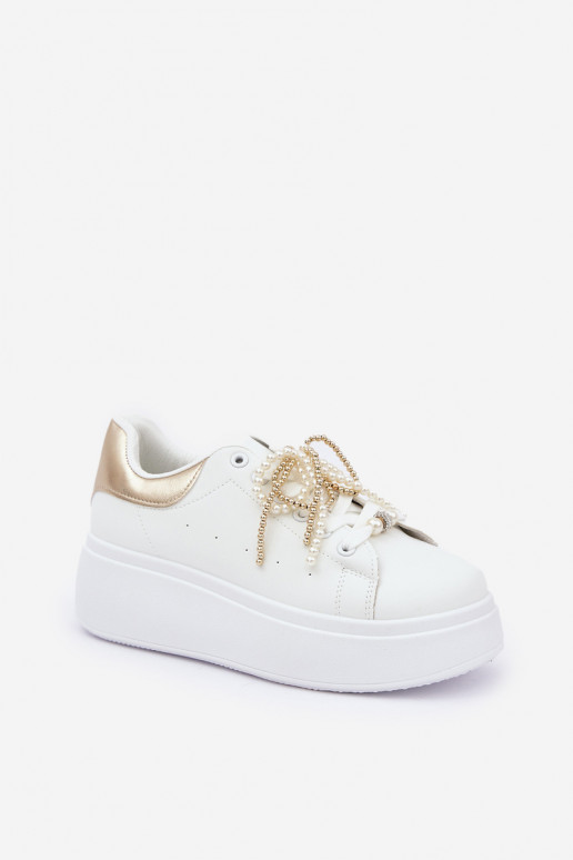 Sneakers model schoenen Dames met platform met mooie details INit-gouden kleur Lerissna