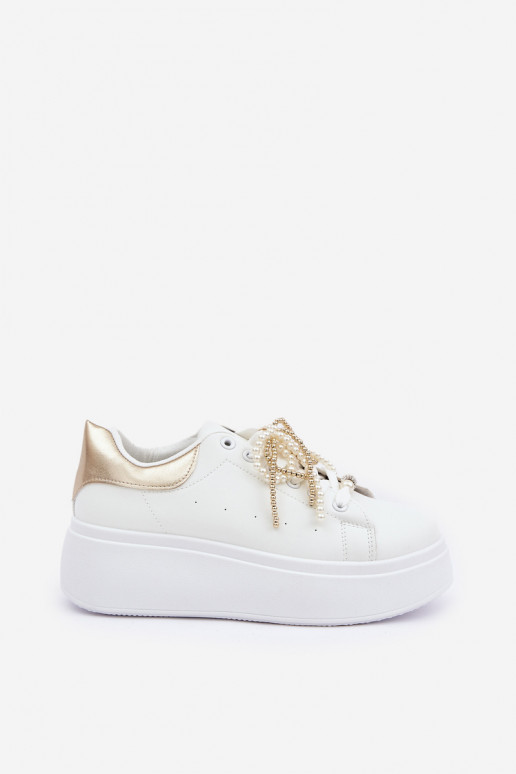 Sneakers model schoenen Dames met platform met mooie details INit-gouden kleur Lerissna