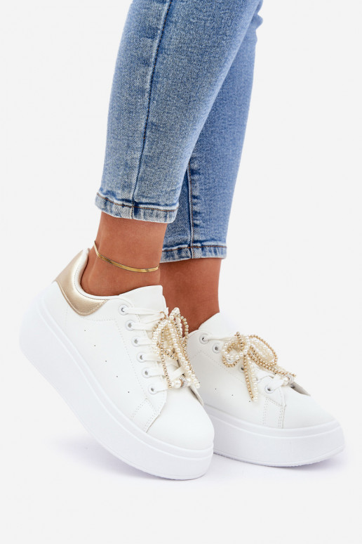 Sneakers model schoenen Dames met platform met mooie details INit-gouden kleur Lerissna