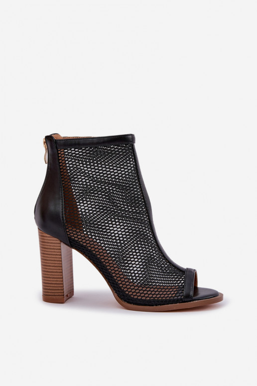 des sandales avec des talons avec une botte couleur noire Taniffia