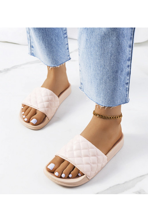 Kates lyserøde quiltede flip-flops
