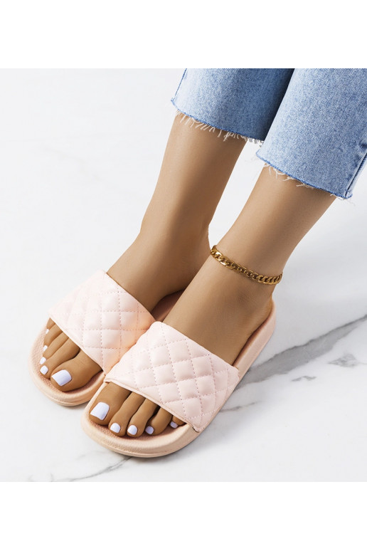 Kates lyserøde quiltede flip-flops