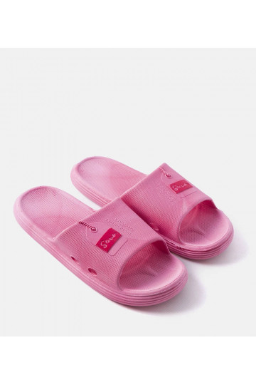 Tongs en mousse rose...