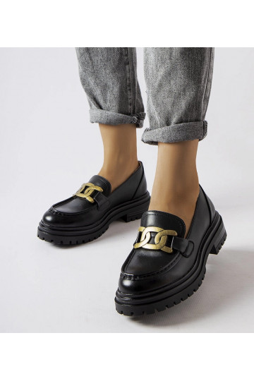 Mocassins noirs décorés...