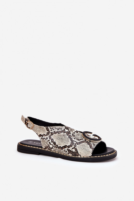 Flache Sandalen mit Ornamenten Schlangenmuster Beige-braune Farbe Haliones Flache Sandalen mit Ornamenten Schlangenmuster Beige-braune Farbe Haliones