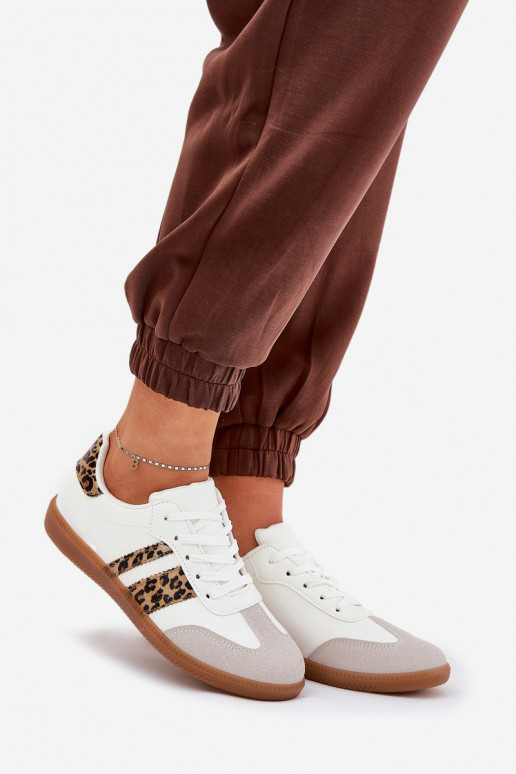Faible Chaussures modèle baskets Féminin en cuir écologique avec des motifs en fourrure de léopard couleur blanche Nonalorin Faible Chaussures modèle baskets Féminin en cuir écologique avec des motifs en fourrure de léopard couleur blanche Nonalorin