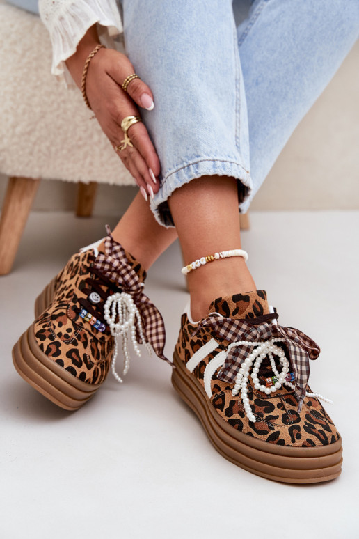 Chaussures modèle baskets Féminin avec des motifs en fourrure de léopard avec une plateforme avec de beaux détails marron Vinnes Chaussures modèle baskets Féminin avec des motifs en fourrure de léopard avec une plateforme avec de beaux détails marron Vinnes