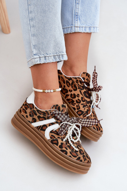 Chaussures modèle baskets Féminin avec des motifs en fourrure de léopard avec une plateforme avec de beaux détails marron Vinnes Chaussures modèle baskets Féminin avec des motifs en fourrure de léopard avec une plateforme avec de beaux détails marron Vinnes