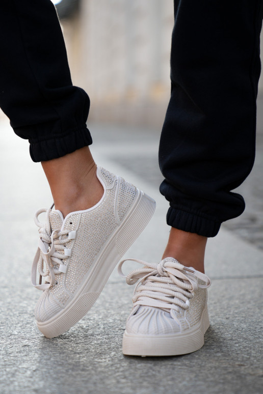 Sneaker-Modell Schuhe für Damen mit Dekoration und Plateau in Sandfarbe Eanneth Sneaker-Modell Schuhe für Damen mit Dekoration und Plateau in Sandfarbe Eanneth
